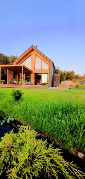 Stodoła Rzym - domek, jacuzzi, sauna, jezioro, las in Kłosówko